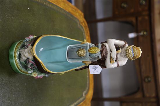 A rare Mintons majolica The Reader Flower Holder, modelled by Albert Carrier-Belleuse, date code for 1873, 49cm, old restoration